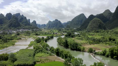 Aerial:-stunning-karst-mountain-landscape-in-China,-Yulong-Li-River-countryside