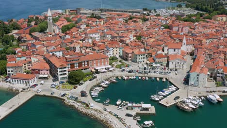 Aerial:-Izola-old-fishing-town-on-Adriatic-coast,-Istrian-peninsula-in-Slovenia
