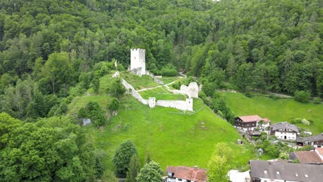 Aerial-view-of-Falkenstein-castle-ruins-in-the-Bavarian-Alps-on-the-river-Inn
