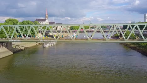 Train-Traveling-At-The-Railroad-Bridge-Over-Weser-River-In-Bremen,-Germany
