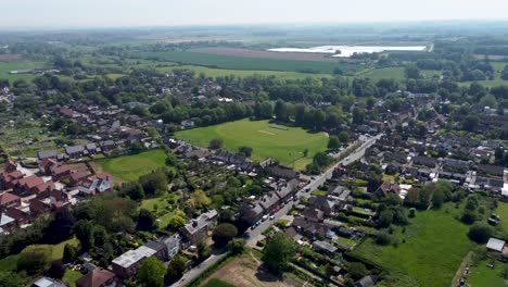 A-high-altitude-view-from-a-drone-of-the-village-of-Littlebourne-in-Kent,-UK