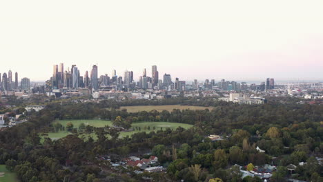 Beautiful-dawn-morning-aerial-jib-shot-revealing-Melbourne-and-its-cityscape-features