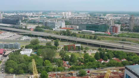 Belgrade-marathon-runners-on-Ada-Bridge,-aerial-view-of-event