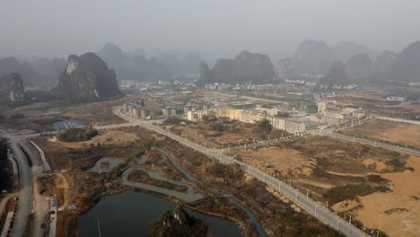 Chinese-urbanization,-city-urban-development-in-Guangxi,-aerial-view