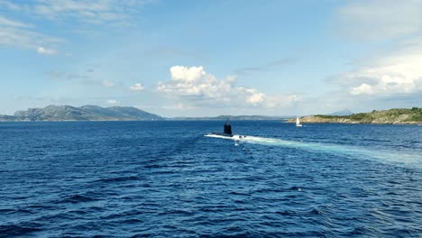 A-submarine-from-Ula-class-Norwegian-navy-is-sailing-through-Leroyosen-fjord-heading-for-navy-base-Haakonsvern
