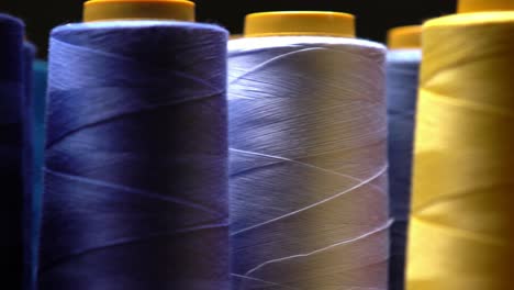 Closeup-Of-Colourful-Cotton-Thread-In-A-Textiles-Manufacturing-Workshop,-Designer-Fashion-Industry