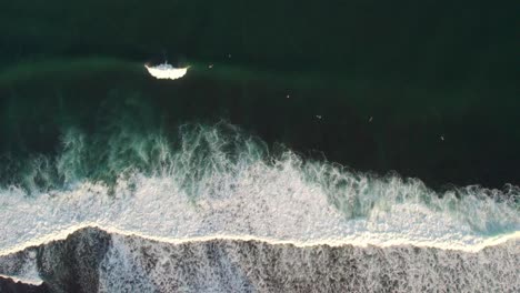 aerial-top-down-of-huge-ocean-waves-in-Indonesia-bali-island-clean-sea-water
