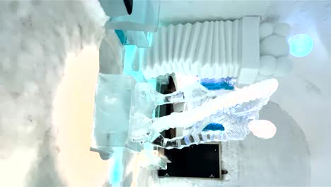 POV-Reveal-Walking-Around-Ice-Hotel-Room-With-Sculpture-In-Room