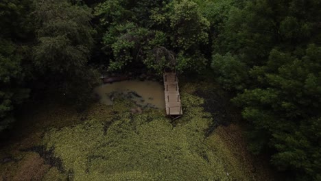 Aerial-drone-shot-of-a-dock-in-a-lake