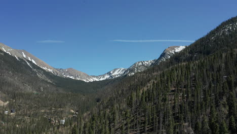 Scenic-aerial-of-Taos-Ski-Valley-hillside-during-summer-season