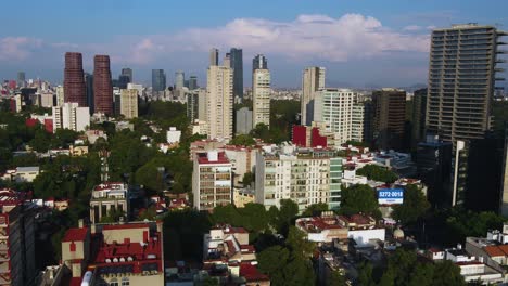 Aerial-view-of-the-cityscape-of-Polanco,-sunny-day-in-Mexico-city---circling,-drone-shot