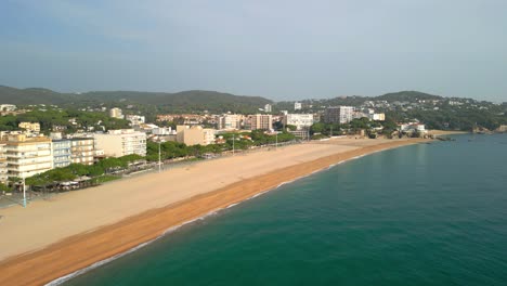 Mediterranean-coast-of-Platja-de-aro-in-Girona-aerial-images-turquoise-blue-sea-beach-without-people