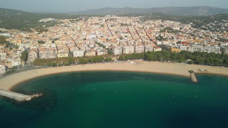Aerial-Drone-Image-Of-Sant-Feliu-De-Guixols-On-The-Costa-Brava-In-Gerona