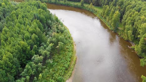 4K-Drone-Video-of-Chena-River-cutting-through-Forest-near-Fairbanks,-Alaska