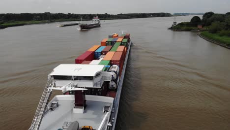 Aerial-Starboard-View-Of-Vigila-Cargo-Ship-Going-Past-On-Oude-Maas