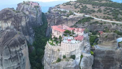 Aerial-view-of-a-monastery-build-on-top-of-Sandstone-in-Meteora-Greece,-aerial