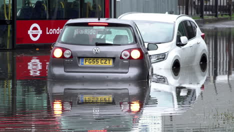 A-bus-and-two-cars-sit-submerged-and-abandoned-in-flood-water-following-thunderstorms-that-saw-more-than-a-month’s-worth-of-torrential-rain-fall-in-several-hours-across-the-capital