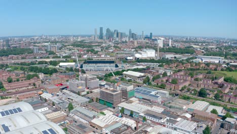 Circling-drone-shot-of-Canary-Wharf-from-South-London-on-a-sunny-day