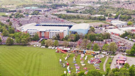 Aerial-shot-flying-over-Hillsborough-football-stadium-in-rural-English-countryside