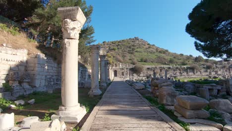 Point-of-view-of-the-walkway-at-Agora-commercial-marketplace-enclosed-by-colonnades-in-Ephesus