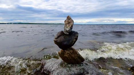 Pile-of-stacked-rocks-on-the-shore-of-Lake-Näsijärvi-in-Tampere-Finland