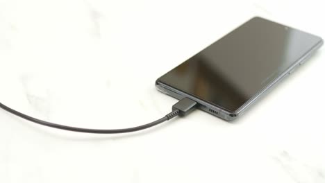 Close-up-of-the-charging-connection-to-smartphone-USB-C-port