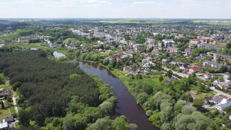 AERIAL-Ascending-Flying-Away-Shot-of-Ukmerge,-Lithuania