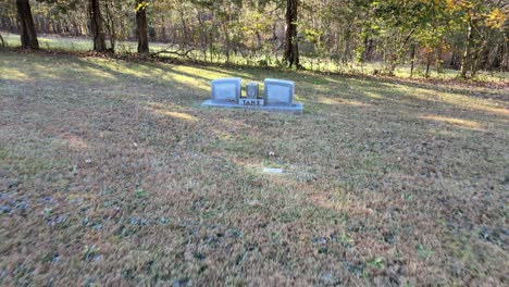 Reverse-shot-revealing-several-tombstones-at-a-cemetery