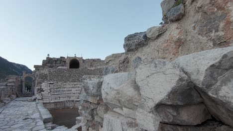 Visitors-point-of-view-reveal-of-ruins-of-an-ancient-theatre,-city-of-Ephesus,-Turkey