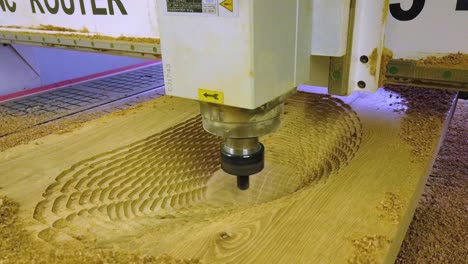 Cnc-router-machine-milling-out-big-hole-out-of-oak-wooden-board-for-wooden-sink