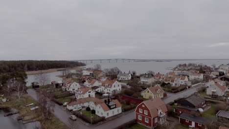 Rural-small-down-Nordic-Icelandic-Iceland-cold-climate-city-aerial-above-neighborhood-houses-village-cute-town-real-estate-lake-vintage-retro-industrial-empty-winter-rustic-villa-field-playing-rainy