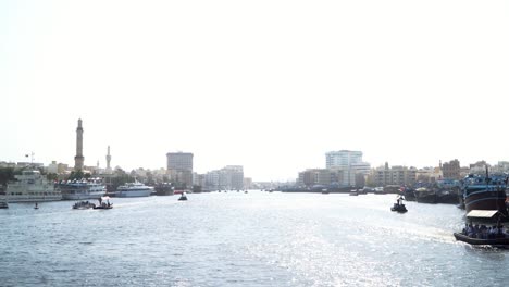 A-view-down-Dubai-Creek-from-a-water-taxi-in-the-middle-of-the-day