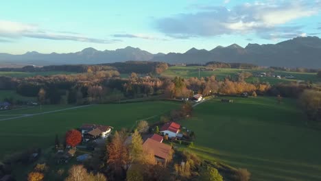 Paning-drone-shot-of-Bavaria,-the-alps-and-the-Chiemsee-at-the-end
