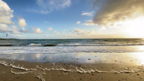 Beautiful-sunset-over-Atlantic-ocean-from-a-sandy-beach-in-Ireland