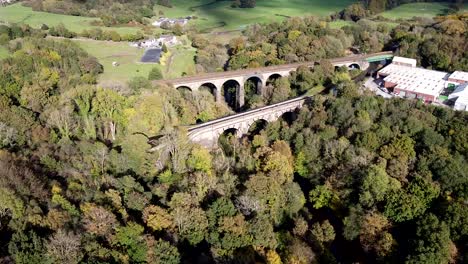 Establishing-aerial-drone-clip-of-Marple-Aqueduct-and-Viaduct-in-the-United-Kingdom-with-boats-crossing