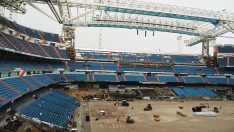 Loader-Equipment-Working-On-The-Ground-Of-A-Football-Stadium-Under-Construction