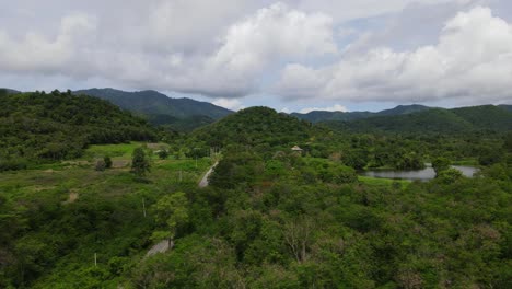 Aerial-sliding-footage-towards-the-left-revealing-Kaeng-Krachan-National-Park,-UNESCO-World-Heritage-site,-Thailand
