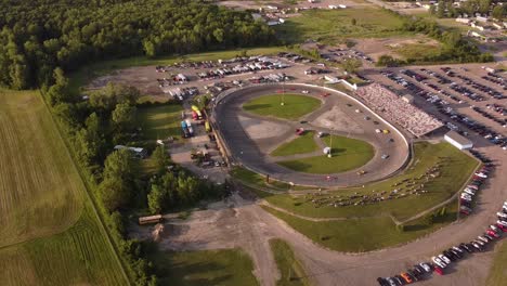 Cars-Racing-On-The-Race-Track-In-Ash-Township,-Michigan