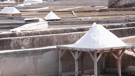 Salt-Drying-On-Wooden-Tables-At-Rio-Maior-Salt-Pans-In-Portugal