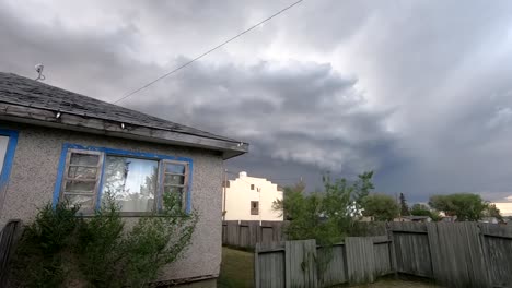 Huge-storm-in-the-sky-over-a-small-house-in-the-country