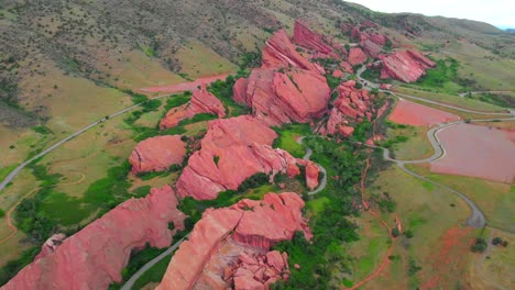 Aerial-wide-shot-of-Red-Rocks-Park-and-Amphitheatre-on-beautiful-day