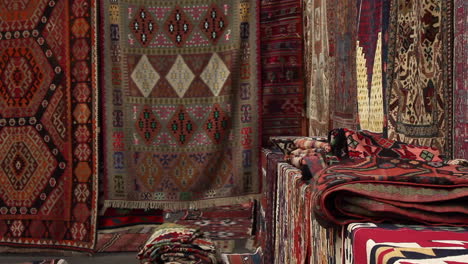 Selection-of-rugs-for-sale-in-street-in-Yerevan,-Armenia