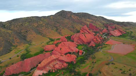 Aerial-panning-shot-of-Red-Rocks,-outdoors-live-venue-outside-Denver,-Colorado