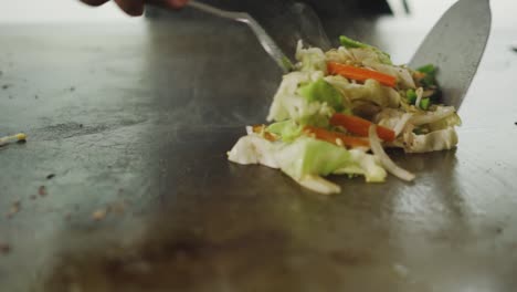Teppanyaki---Cooking-Vegetables-In-Griddle-Using-Metal-Spatula