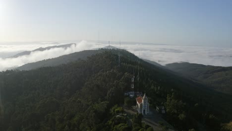 Church-Of-Santa-Justa-In-The-Mountains-With-Forest-And-Clouds-In-Background-At-Sunrise-In-Valongo,-Portugal