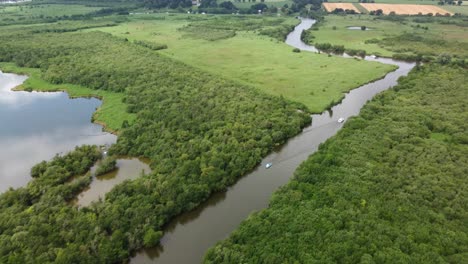 Aerial-drone-view-of-drone-flying-over-the-river-steam-in-the-forest--climate-change-effect-on-water-level-on-the-rivers