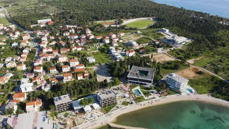 Small-Town-Of-Novalja-On-The-Island-Of-Pag-In-Croatia---aerial-drone-shot