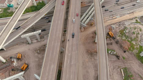 Brids-eye-view-of-traffic-on-610-and-59-South-freeway-in-Houston,-Texas
