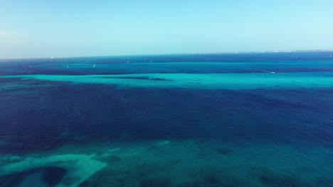 Aerial-view-of-the-open-sea-at-sunny-day-in-Caribbean-near-Cancun-Mexico