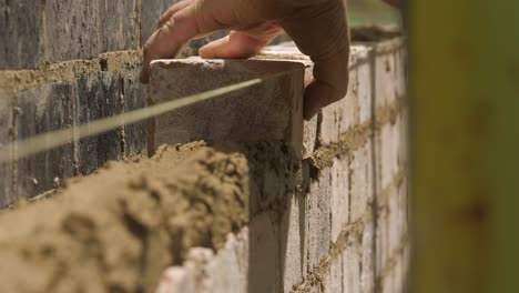 CLOSE-UP,-Brick-Laid-On-Wet-Mortar-For-House-Wall-Construction